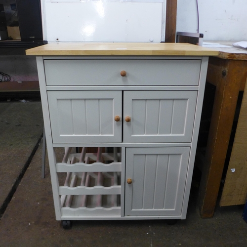 2115 - An off white three drawer kitchen unit plus wine rack, height 33