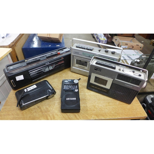 2120 - A quantity of portable radios including a Ferguson 3 band radio cassette recorder, a Steepletone SAB... 