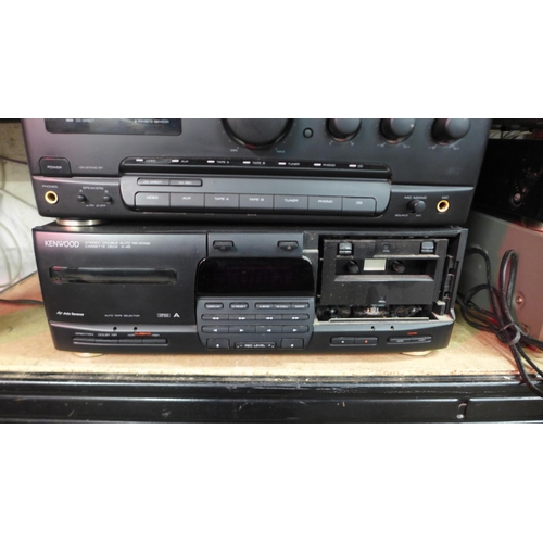 2124 - A quantity of Kenwood stereo equipment including a P-26 stereo automatic return turntable system, a ... 