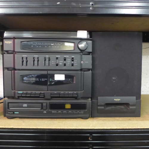 2125 - A quantity of Matsui stereo equipment including a turntable record player, stereo tuner, stereo doub... 