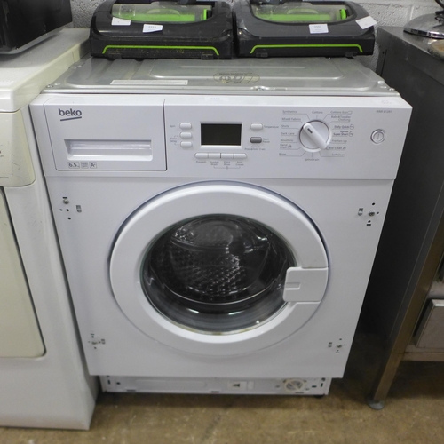 2155 - A Beko (WM161241) 6.5kg 1200 spin integrated washing machine