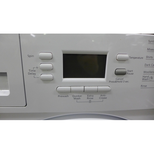 2155 - A Beko (WM161241) 6.5kg 1200 spin integrated washing machine