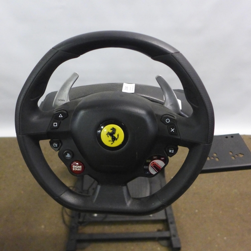 2160 - A video game racing simulator set up including a GT Omega racing style gaming chair, a racing simula... 