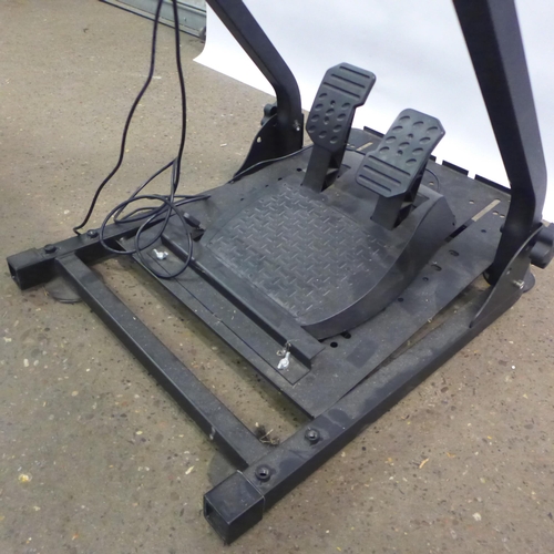 2160 - A video game racing simulator set up including a GT Omega racing style gaming chair, a racing simula... 