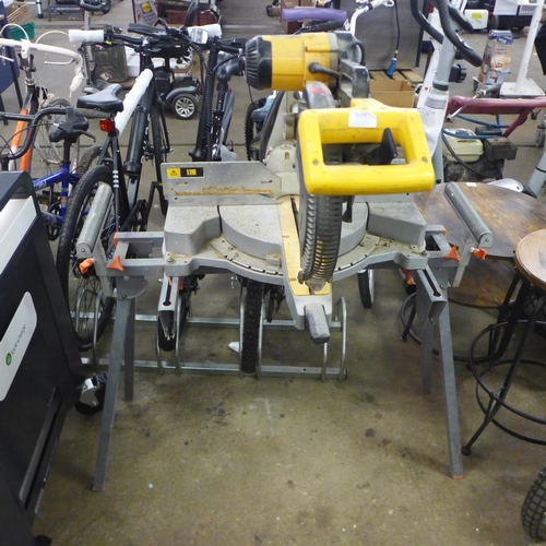 2165 - A Dewalt DW708 230v 305mm sliding mitre saw and leg stand