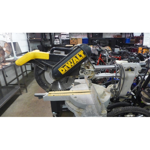 2165 - A Dewalt DW708 230v 305mm sliding mitre saw and leg stand