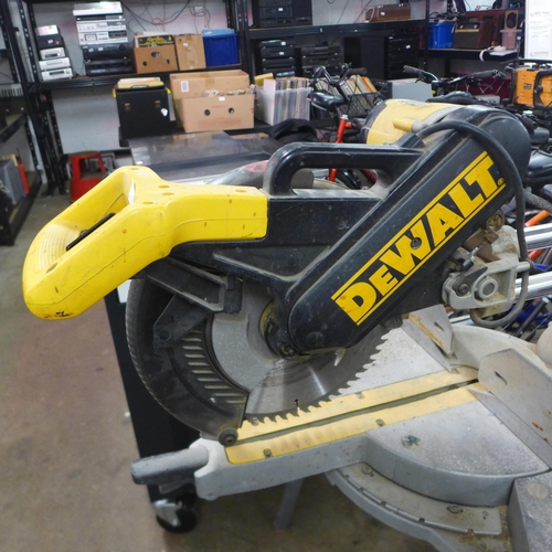 2165 - A Dewalt DW708 230v 305mm sliding mitre saw and leg stand