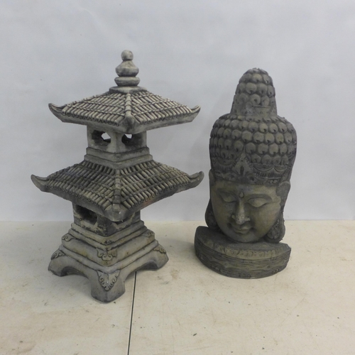 2183 - A 65cm, two tier antique effect concrete pagoda and a 60cm antique effect concrete Buddha bust ornam... 