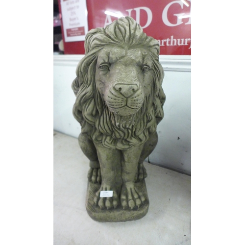 2184 - A pair of 60cm antique effect concrete lions