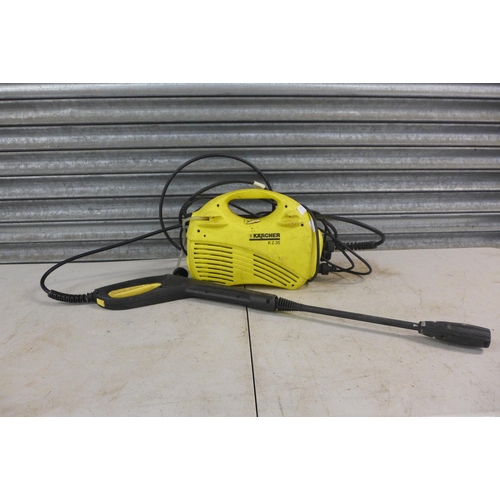 2219 - A Karcher K2.35 pressure washer with hose and lance