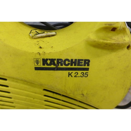 2219 - A Karcher K2.35 pressure washer with hose and lance