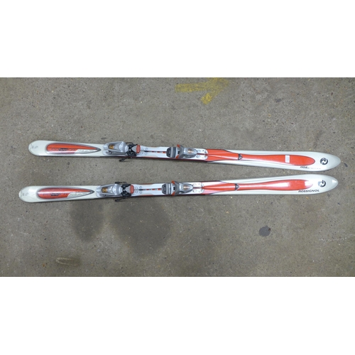 2232 - A pair of Rossignol skis and poles in carry case