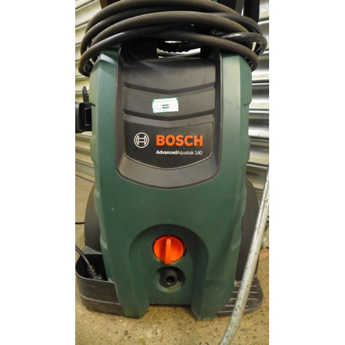 2256 - A Bosch Advanced Aquatak 140 electric high pressure jet washer with hose and lance - 2100w 140 BAR