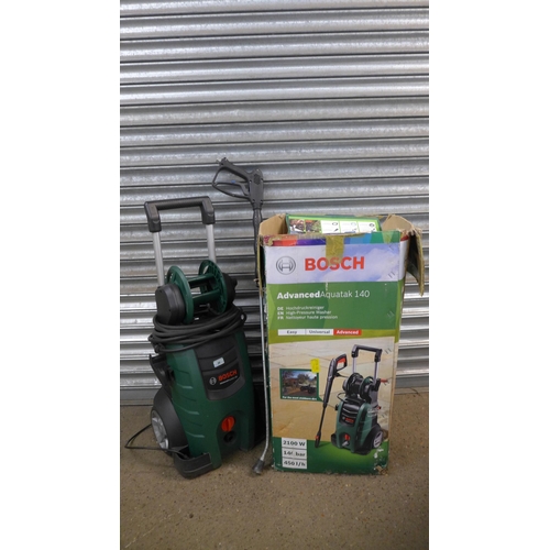 2256 - A Bosch Advanced Aquatak 140 electric high pressure jet washer with hose and lance - 2100w 140 BAR