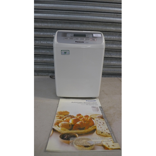 2265 - A Panasonic SD-255 automatic bread maker with operating instructions and recipe booklet