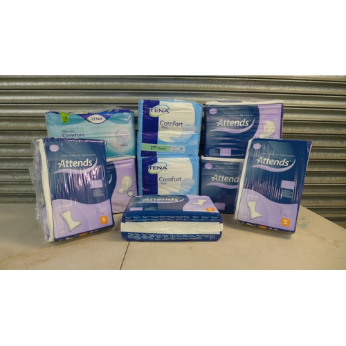 2272 - 12 Packs of hygiene pads; 9 packs of Attends Contour Regular 3 size 7, 6 packs of 5 and 3 packs of T... 