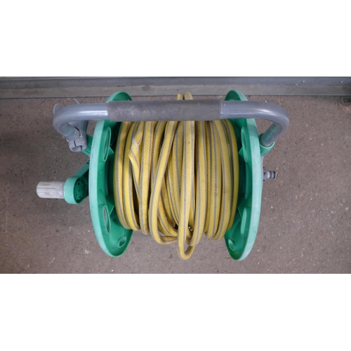 2288 - A Hozelock hose reel and trolley set