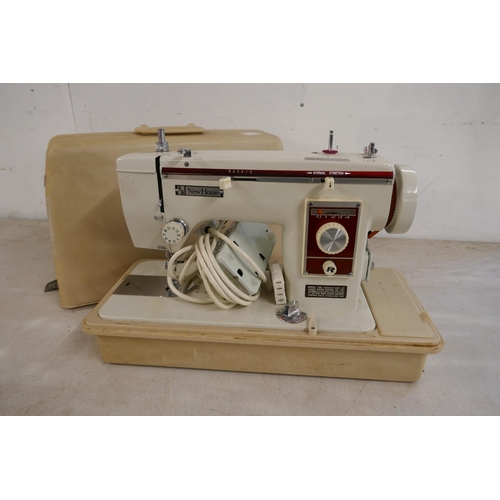 2329 - A Newhome model 539 vintage electric sewing machine in hard case