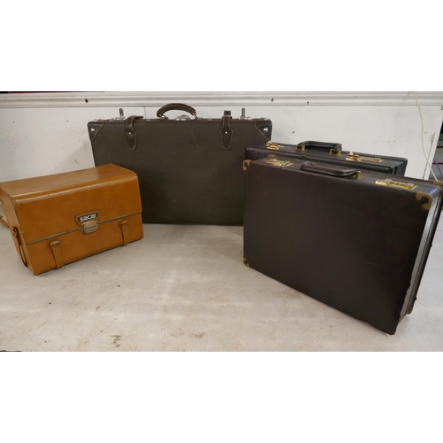 2330 - A collection of four leather cases