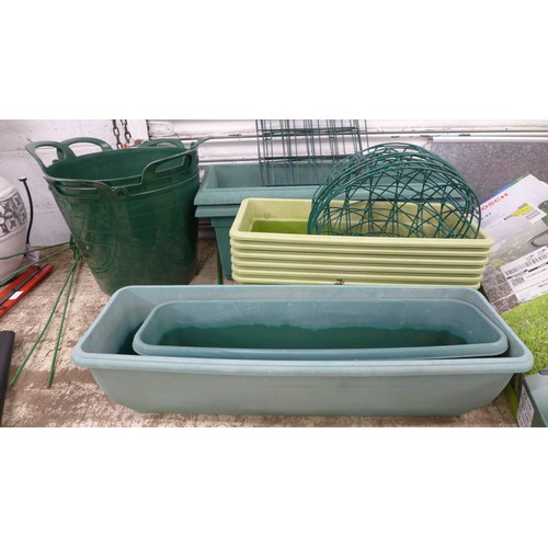 2204 - Ten assorted plastic troughs in assorted sizes including a trough planter with water tray insert, th... 