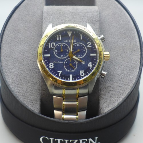 2108 - A men's Citizen Eco-Drive stainless steel chronograph wristwatch with blue dial and two tone bracele... 