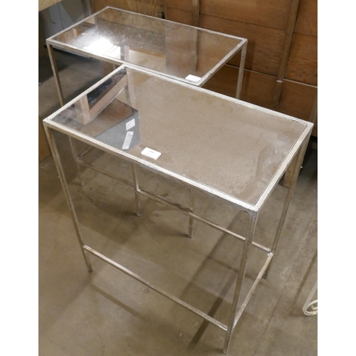 256 - A pair of Italian style mirrored side tables