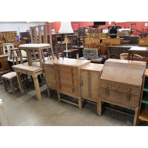 258 - An Art Deco Heals style limed oak dining suite, comprising; sideboard, table, chairs and a bureau