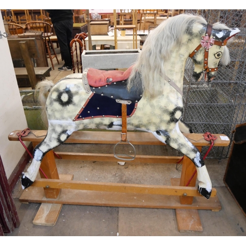 285 - A vintage dapple grey rocking horse