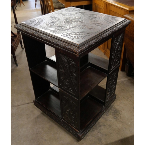 167 - A Victorian Jacobean Revival carved oak bookcase