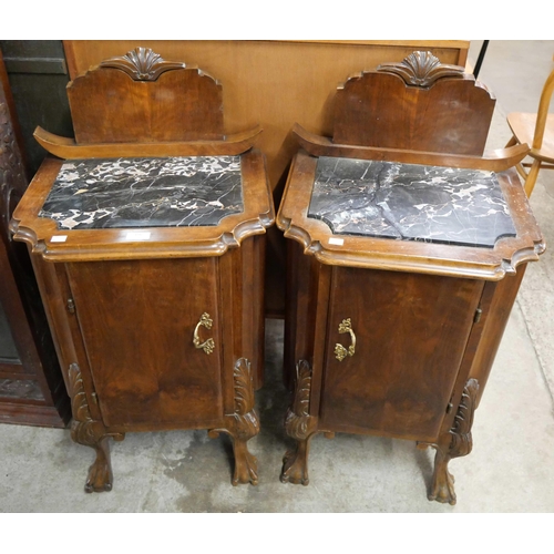 174 - A pair of French Art Deco walnut and marble topped table de nuits