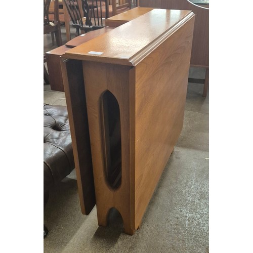 93 - A Jentique 507 model teak drop-leaf table