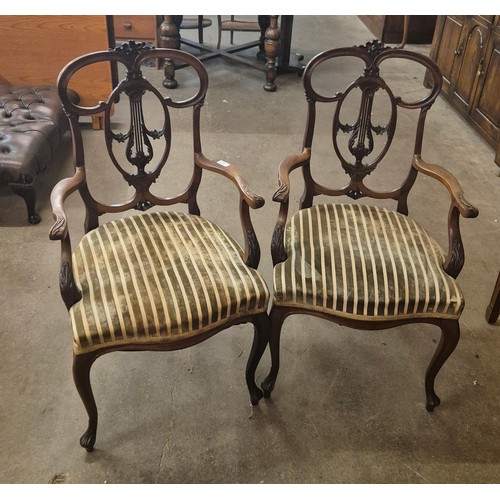 94 - A pair of Edward VII mahogany elbow chairs