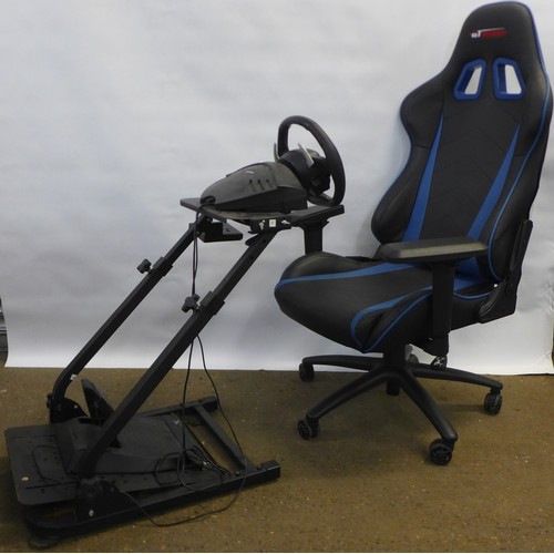 2160 - A video game racing simulator set up including a GT Omega racing style gaming chair, a racing simula... 