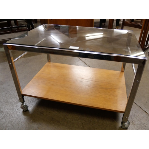 45 - A Howard Miller chrome, teak and glass topped coffee table