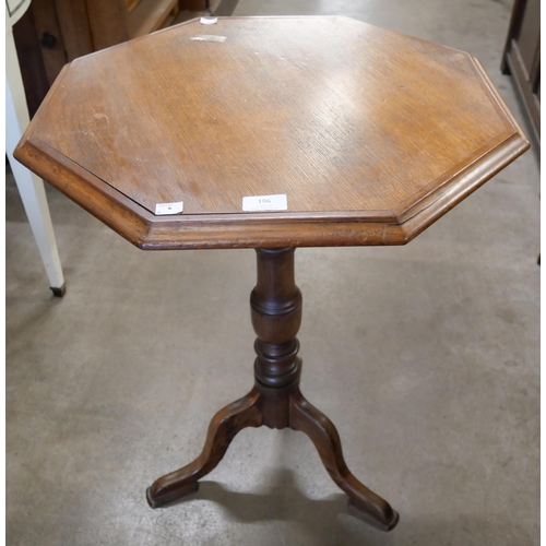 196 - A Victorian oak octagonal tilt-top tripod table