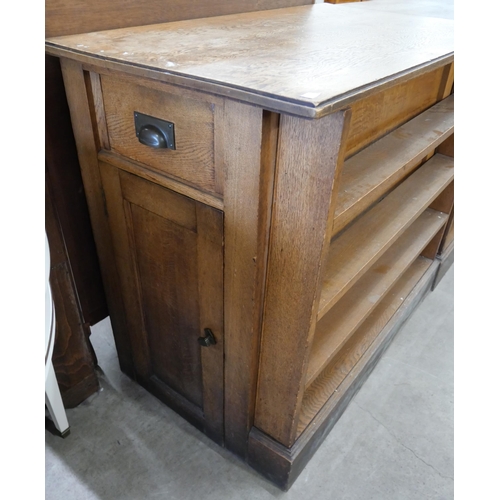 198 - A pair of oak library bookcases/cupboards