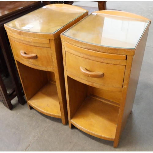 215 - A pair of Art Deco walnut bedside cabinets