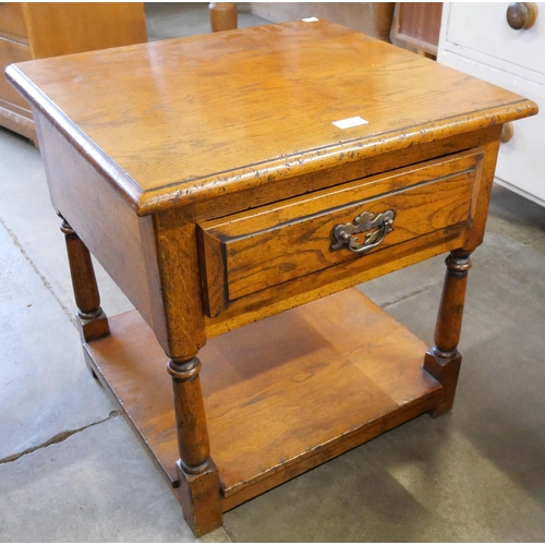 238 - A George III style Ipswich oak single drawer lamp table