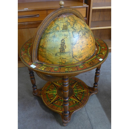 24 - An Italian terrestrial globe cocktail cabinet/trolley