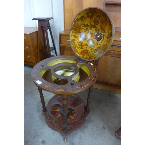 25 - An Italian terrestrial globe cocktail cabinet/trolley