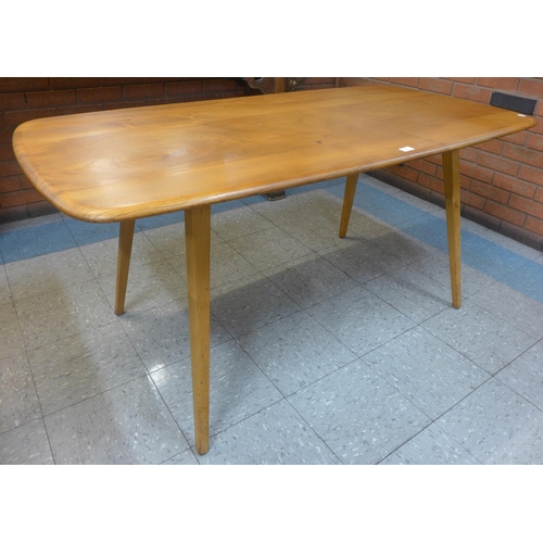 6 - An Ercol Blonde elm and beech plank top Windsor dining table