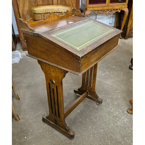 163 - An Arts and Crafts inlaid oak Davenport top desk