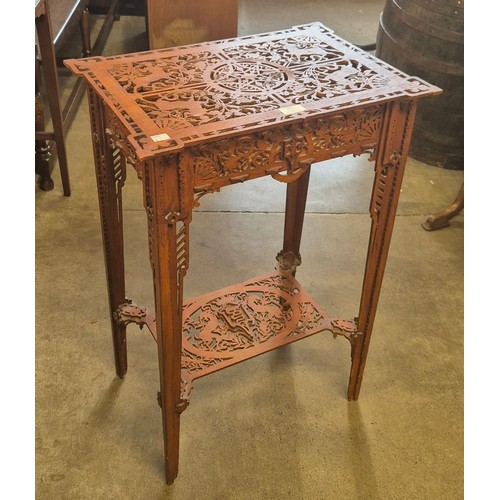 183 - A continental carved fretwork table