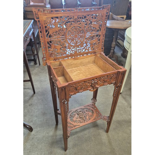 183 - A continental carved fretwork table