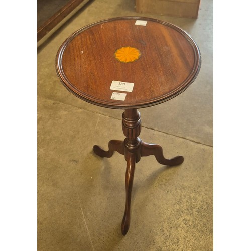 188 - A Regency style inlaid mahogany tripod wine table