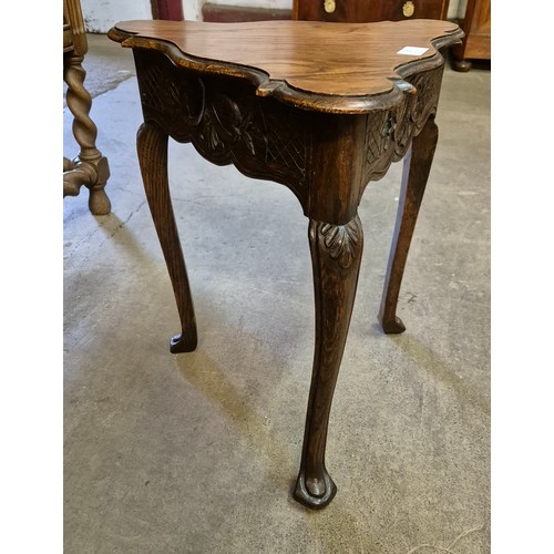 220 - A late 19th Century French carved oak trefoil shaped occasional table