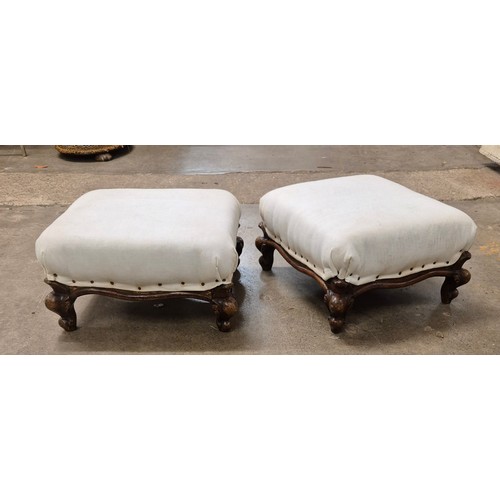 229 - A pair of Victorian walnut footstools