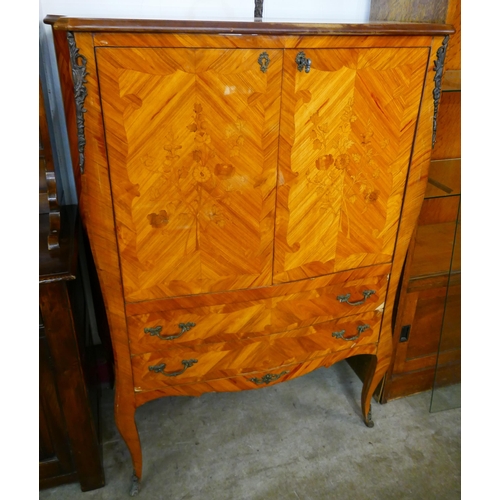 151 - A French Louis XV style inlaid kingwood and gilt metal mounted side cabinet