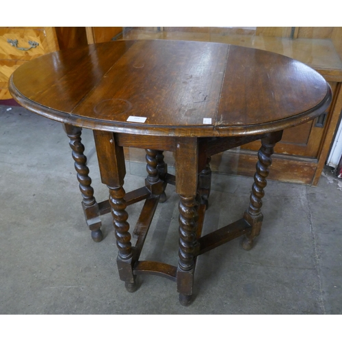 103 - A small oak barleytwist gateleg table