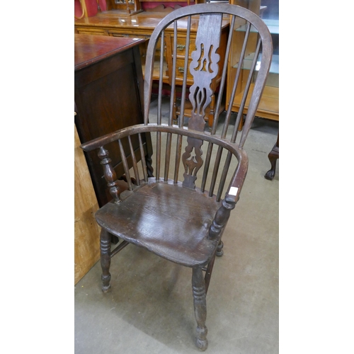 112 - A 19th Century elm and beech highback Windsor chair